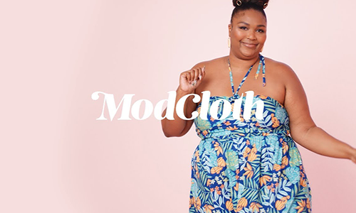 ModCloth logo in front of woman
